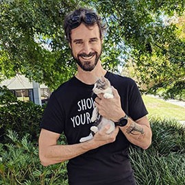 Man holding a kitten