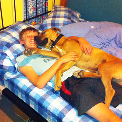 Ammo snoozes alongside his best buddy